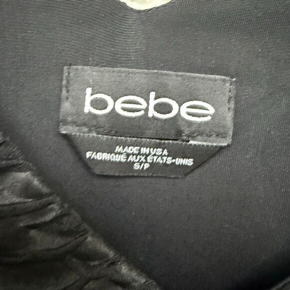 Y2K Bebe black  cap sleeve ruched peplum top with a snakeskin texture size small - Picture 3 of 3